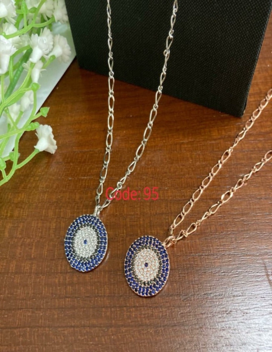 Jinders Stylish Evil Eye Necklace With Encrusted Faux Sapphires And Faux Diamonds Pendant